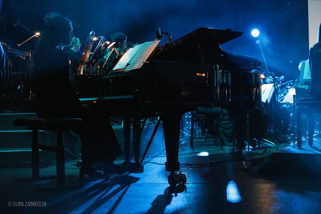 On stage, completely in her element: Sophia Dorosh, the orchestra’s pianist.