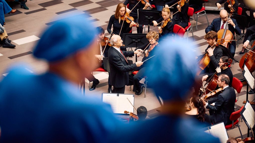 The Concertgebouw Orchestra performs in the central square of the hospital