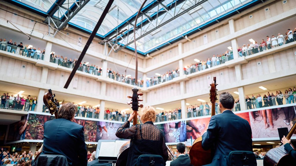 The Concertgebouw Orchestra performs in the central square of the hospital